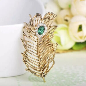 VQ Feather Brooch with Green Crystal